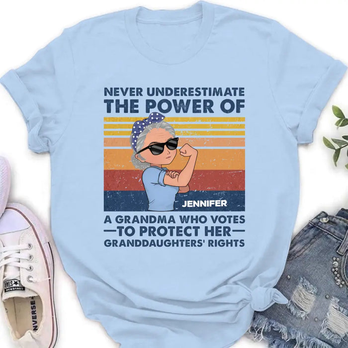 Personalized Grandma Votes T-shirt/Long Sleeve/Sweatshirt/Hoodie - Gift Idea For Grandma - Never Underestimate The Power Of A Grandma Who Votes To Protect Her Granddaughters' Rights