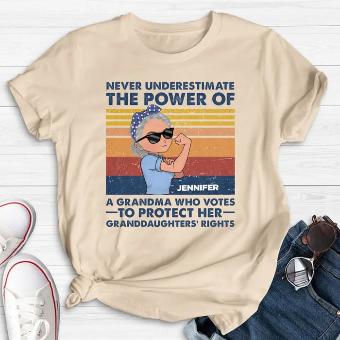 Personalized Grandma Votes T-shirt/Long Sleeve/Sweatshirt/Hoodie - Gift Idea For Grandma - Never Underestimate The Power Of A Grandma Who Votes To Protect Her Granddaughters' Rights