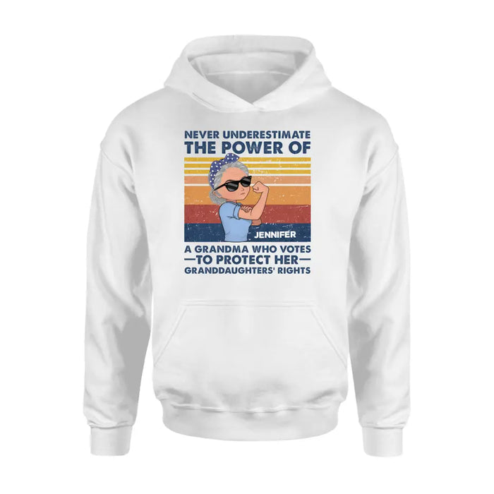 Personalized Grandma Votes T-shirt/Long Sleeve/Sweatshirt/Hoodie - Gift Idea For Grandma - Never Underestimate The Power Of A Grandma Who Votes To Protect Her Granddaughters' Rights