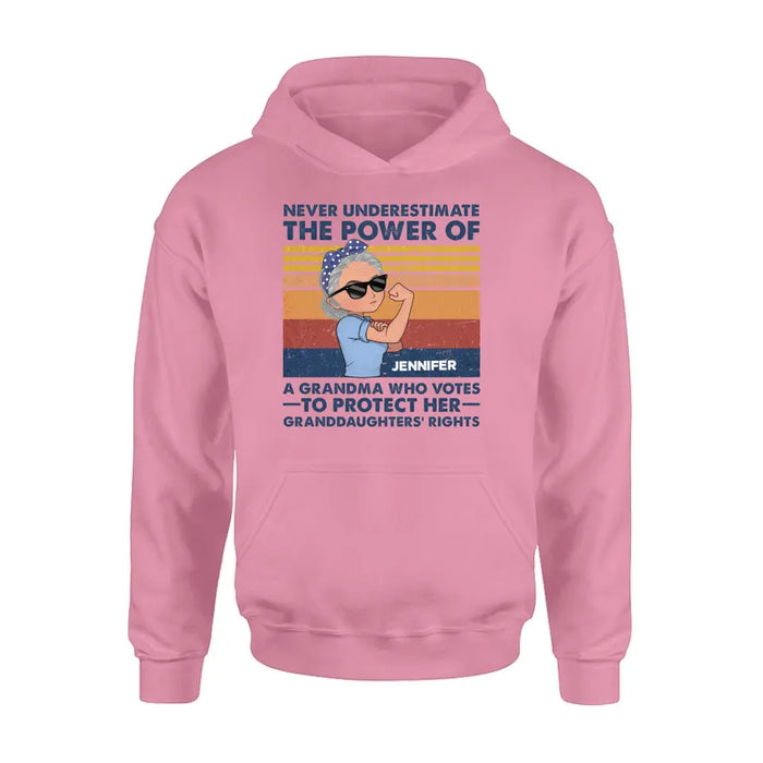 Personalized Grandma Votes T-shirt/Long Sleeve/Sweatshirt/Hoodie - Gift Idea For Grandma - Never Underestimate The Power Of A Grandma Who Votes To Protect Her Granddaughters' Rights