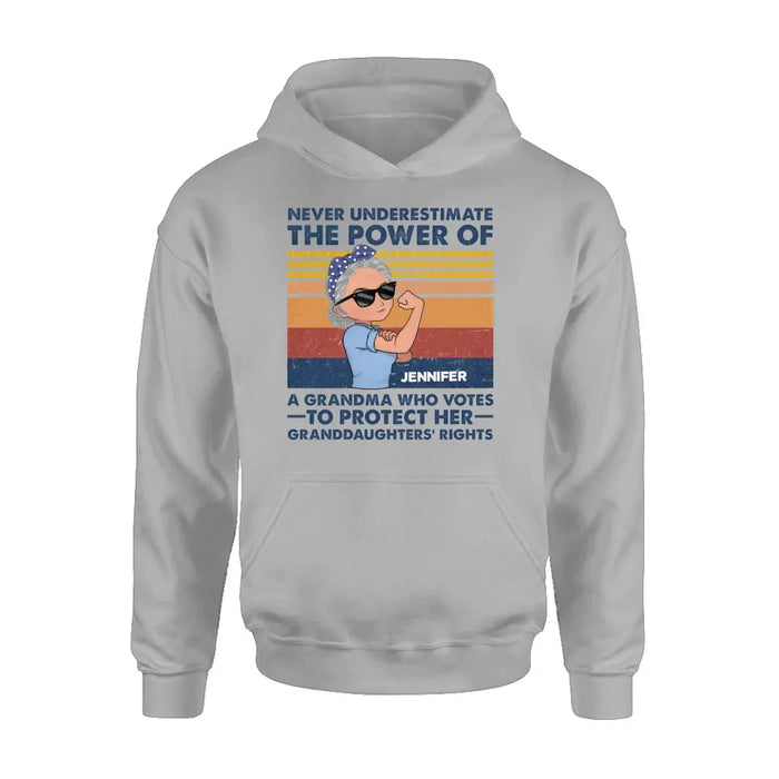 Personalized Grandma Votes T-shirt/Long Sleeve/Sweatshirt/Hoodie - Gift Idea For Grandma - Never Underestimate The Power Of A Grandma Who Votes To Protect Her Granddaughters' Rights